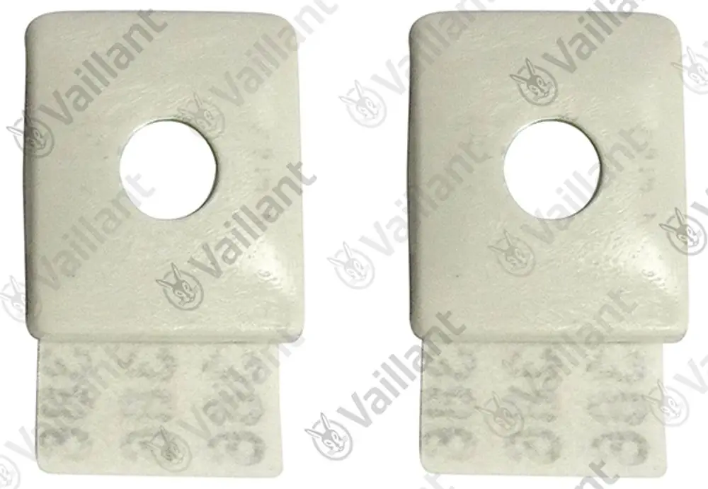 Vaillant-Magnet in rechteckiger Form mit rundem Loch und einer Basis. Zwei Stücke präsentiert, geeignet für spezifische Anwendungen in Heizsystemen.